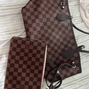 brown bag and wristlet